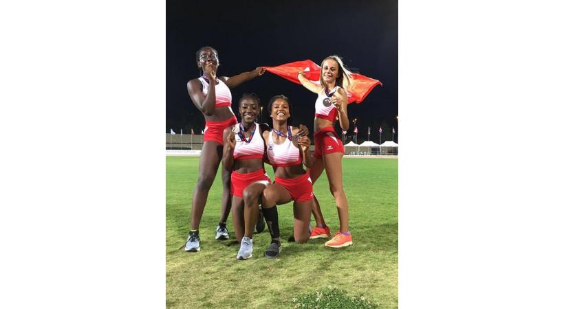 Les médaillées de bronze au relais 4x100m, de g. à d.: Maëline Adjaouté, Mileina Tsogo Eloundou, Laetitia Hartmann et Lou Rossinelli. DR